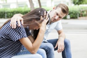 Recognizing Addiction: How to Know When a Loved One Needs Your Help - man comforting woman - waypoint recovery center