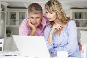 interventionist, Addiction Professional, Intervention, How to Bring an Addiction Professional into Your Intervention - couple searching the internet