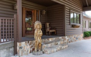 170601-Chris-and-Cami-Photography-0005 - view of front door area with wooden native american statue