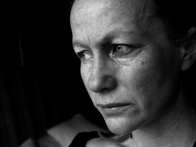 victim mentality and addiction - sad woman