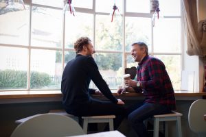 7 Tips to Help You Choose a Sponsor in Recovery - men having coffee