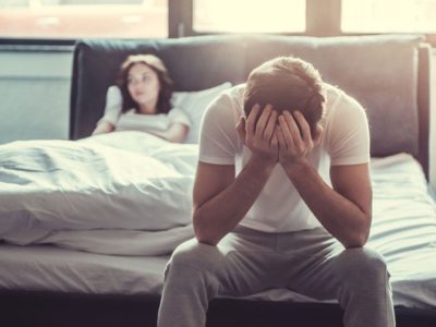 sexual dysfunction, Sexual Health after Rehab, How Substance Use Causes Sexual Dysfunction, Addressing-Sexual-Dysfunction-as-Part-of-Your-Addiction-Recovery - couple in bedroom man upset