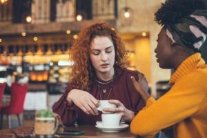 How Do I Convince How to Help an Addict That Doesn't Want Help, My Loved One to Seek Treatment?, Encouraging a Loved One to Seek Treatment, girl supporting her friend as they talk over coffee - loved one