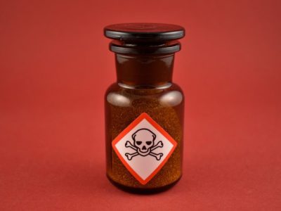 Dangers of Fake Weed, Synthetic cannabinoids, amber glass vial with poison label on it - synthetic marijuana