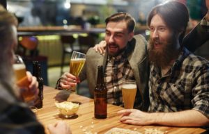 friends at bar binge drinking