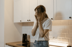 A woman looking worried.