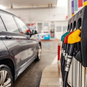 Waypoint - What Is Gas Station Heroin. A vhicle sits at a gas pump with the store in the background