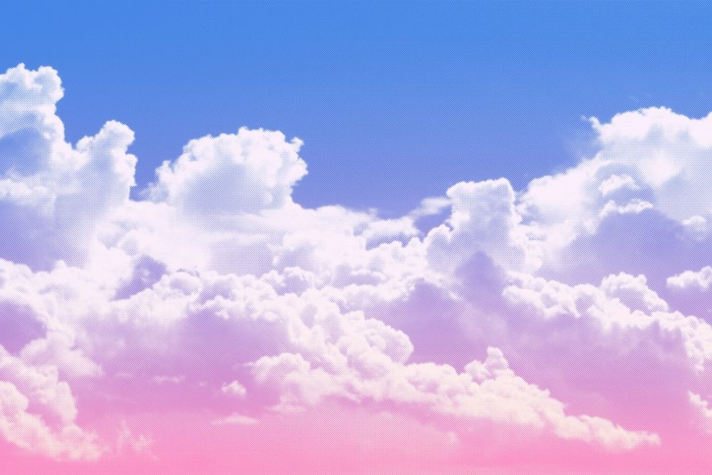 A sky filled with fluffy white clouds, fading from blue at the top to pink at the bottom, creating a soft and dreamy gradient effect.